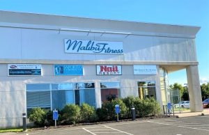 Malibu Fitness storefront with parking lot
