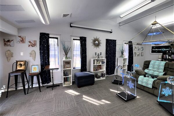 A room with many windows and furniture in it
